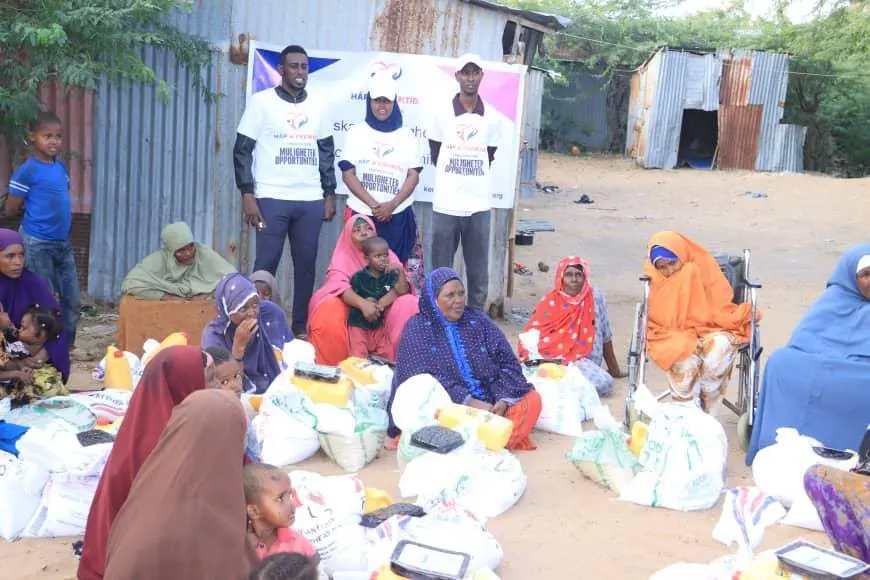 Families receiving food parcels at the Mogadishu distribution